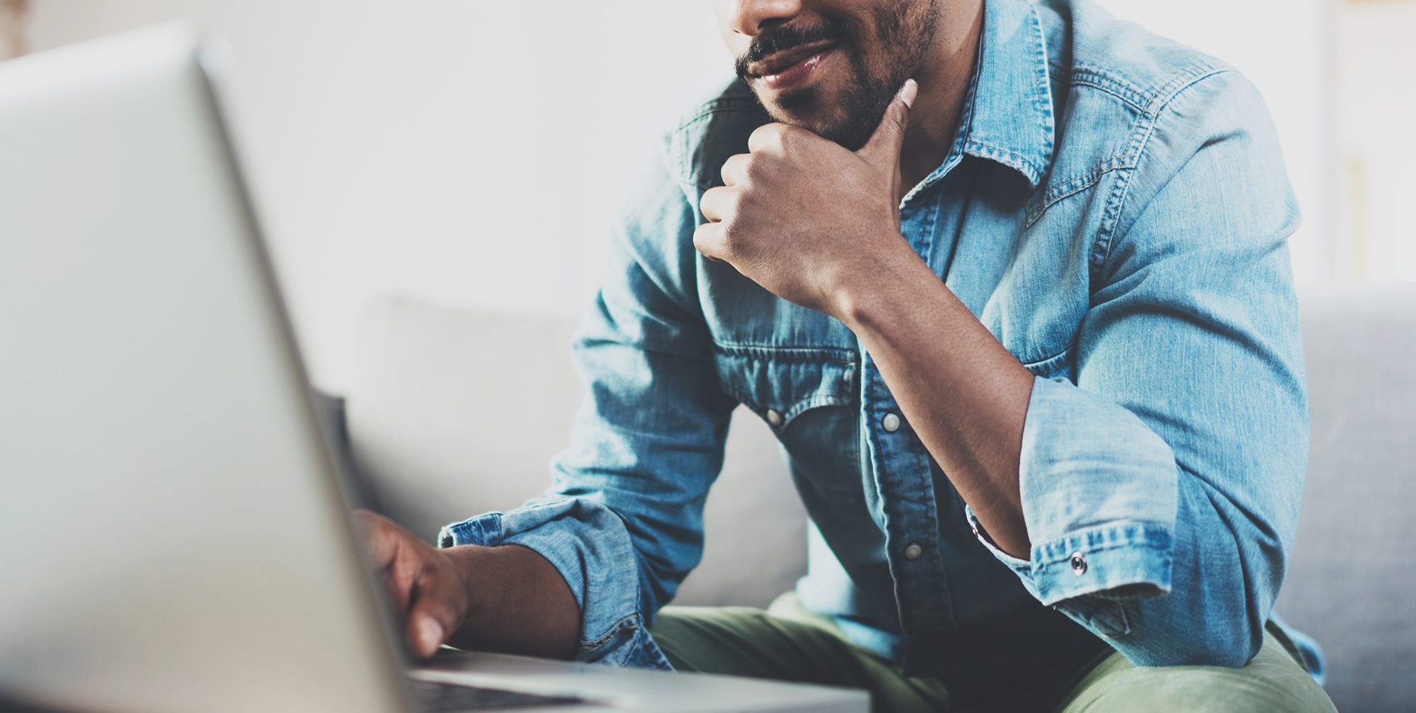 Man looking at a computer