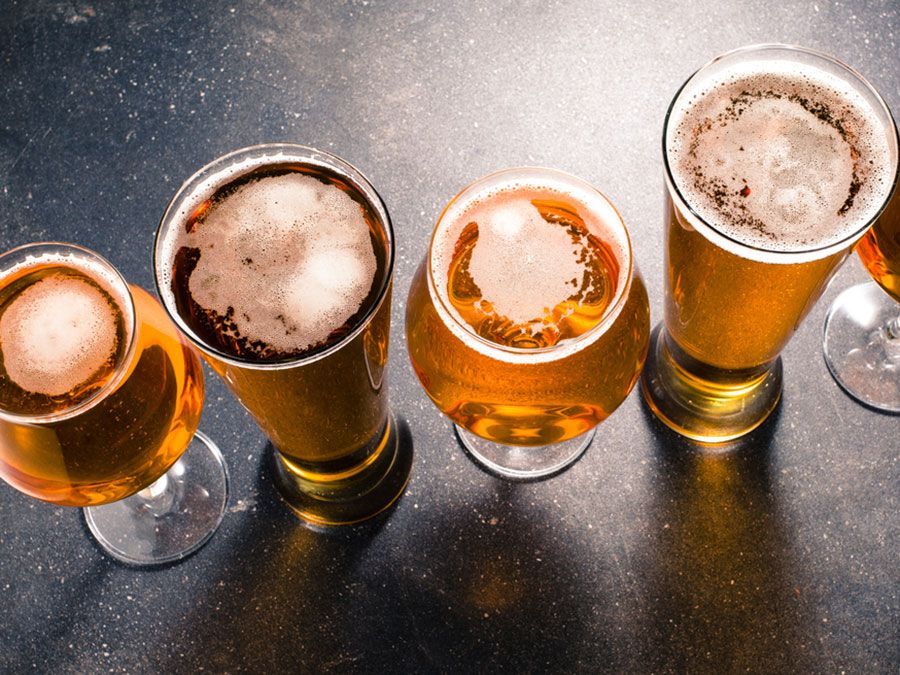 Beer glasses on dark table