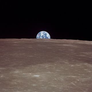  This image taken July 20, 1969 from NASA's Apollo 11 lunar landing mission shows the Earth rising over the limb of the moon. The image was among NASA's first posts on the social photo-sharing service Instagram.