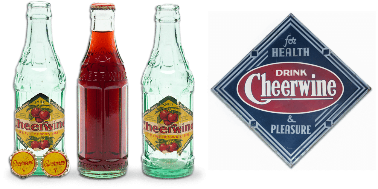 vintage Cheerwine bottles and sign