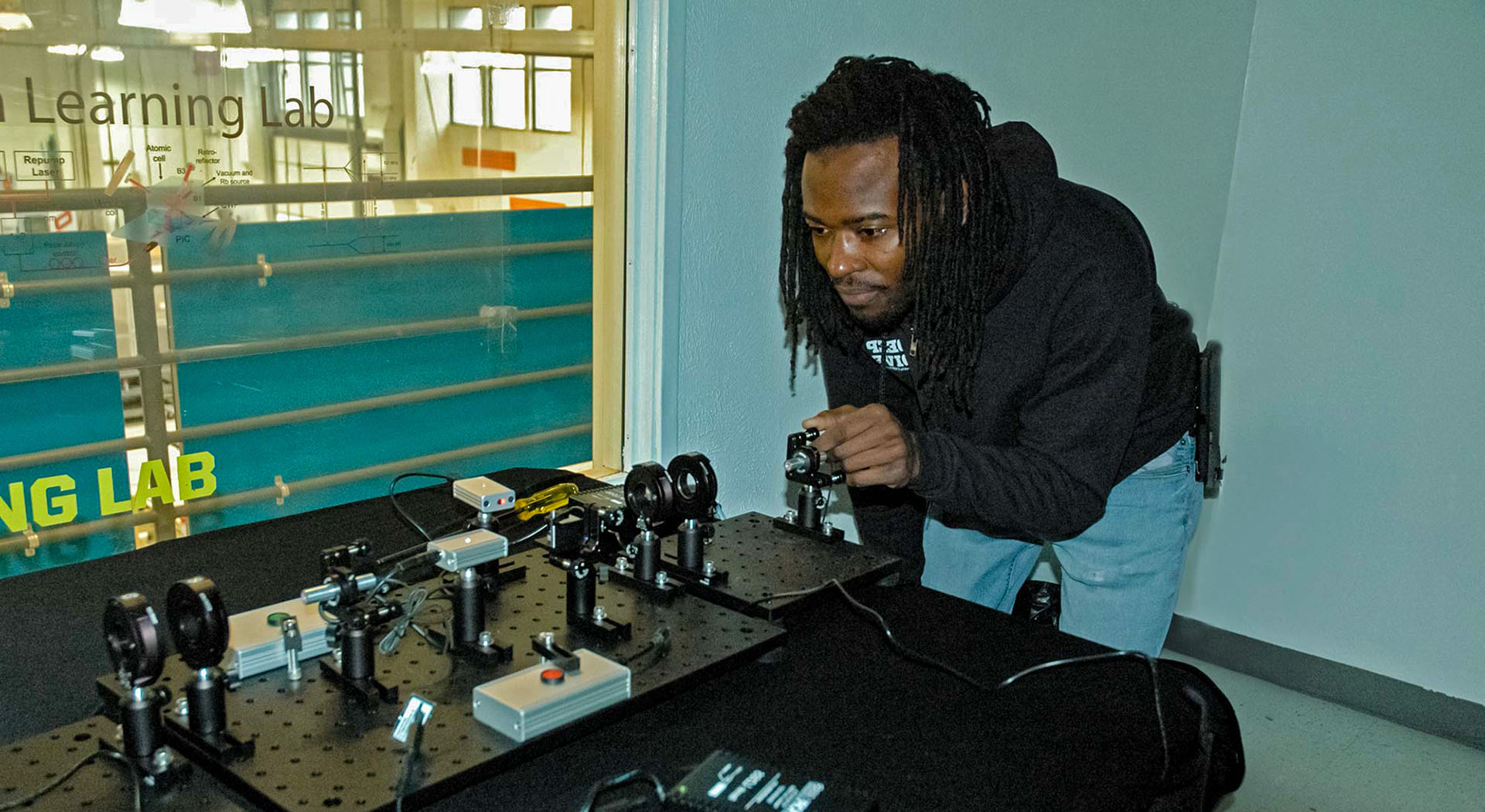 Quantum Technician Bootcamp instructor Edward Ishman demonstrates high-tech manufacturing techniques.