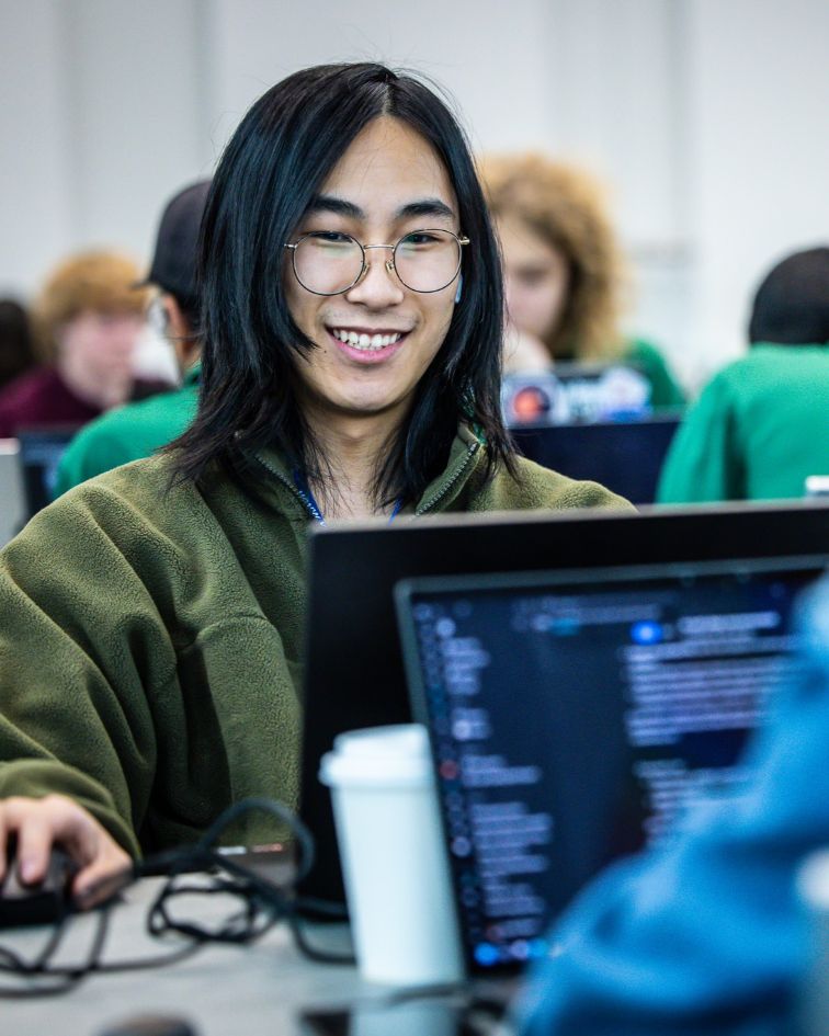 computer science student working on computer