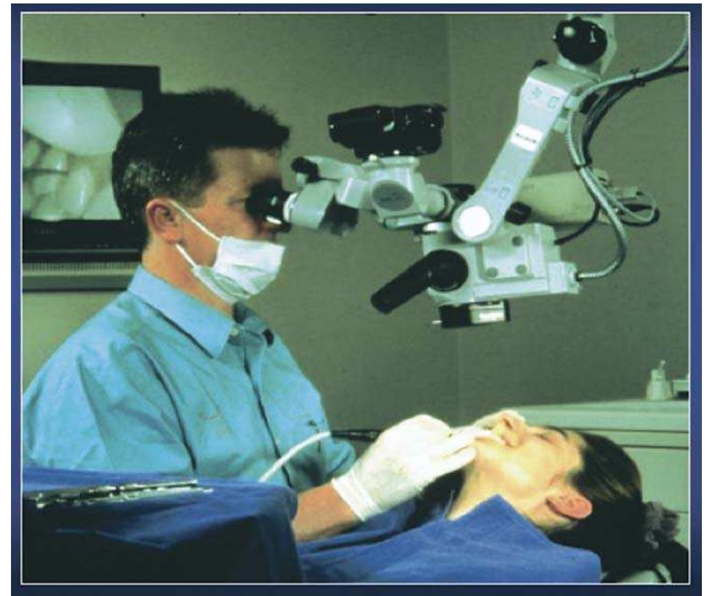 Figure 4. A modern clinical environment in which the microscope provides not only a clinical but also an ergonomic advantage. 