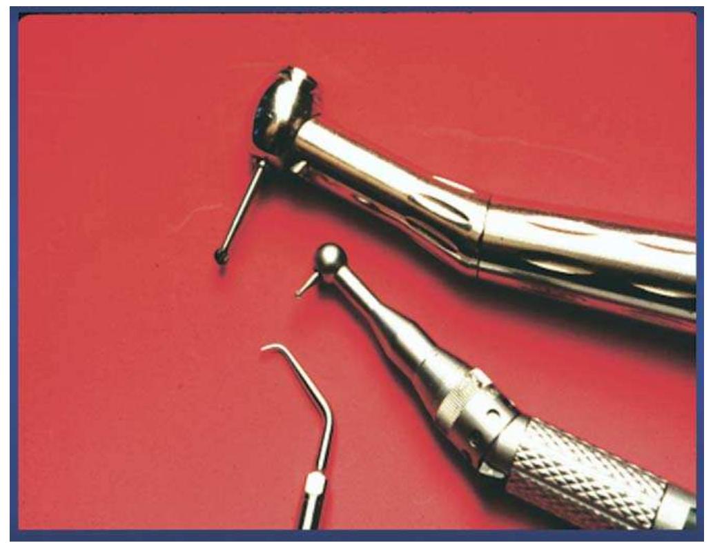 Figure 18. Traditional root-end preparation instruments with burs (top and center) and modern ultrasonic instrument (bottom). (Reprinted with permis- sion from Color Atlas of Microsurgery in Endodontics, by S. Kim with G. Pecora and R. Rubinstein. W.B. Saunders Co., A Harcourt Health Sciences Company, 2001.) 