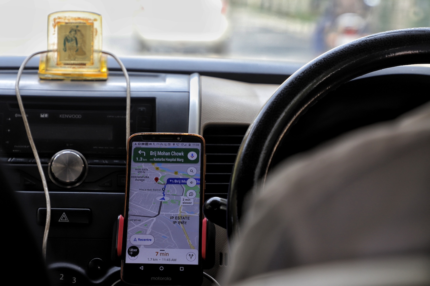 A driver uses Google Maps during a ride in India