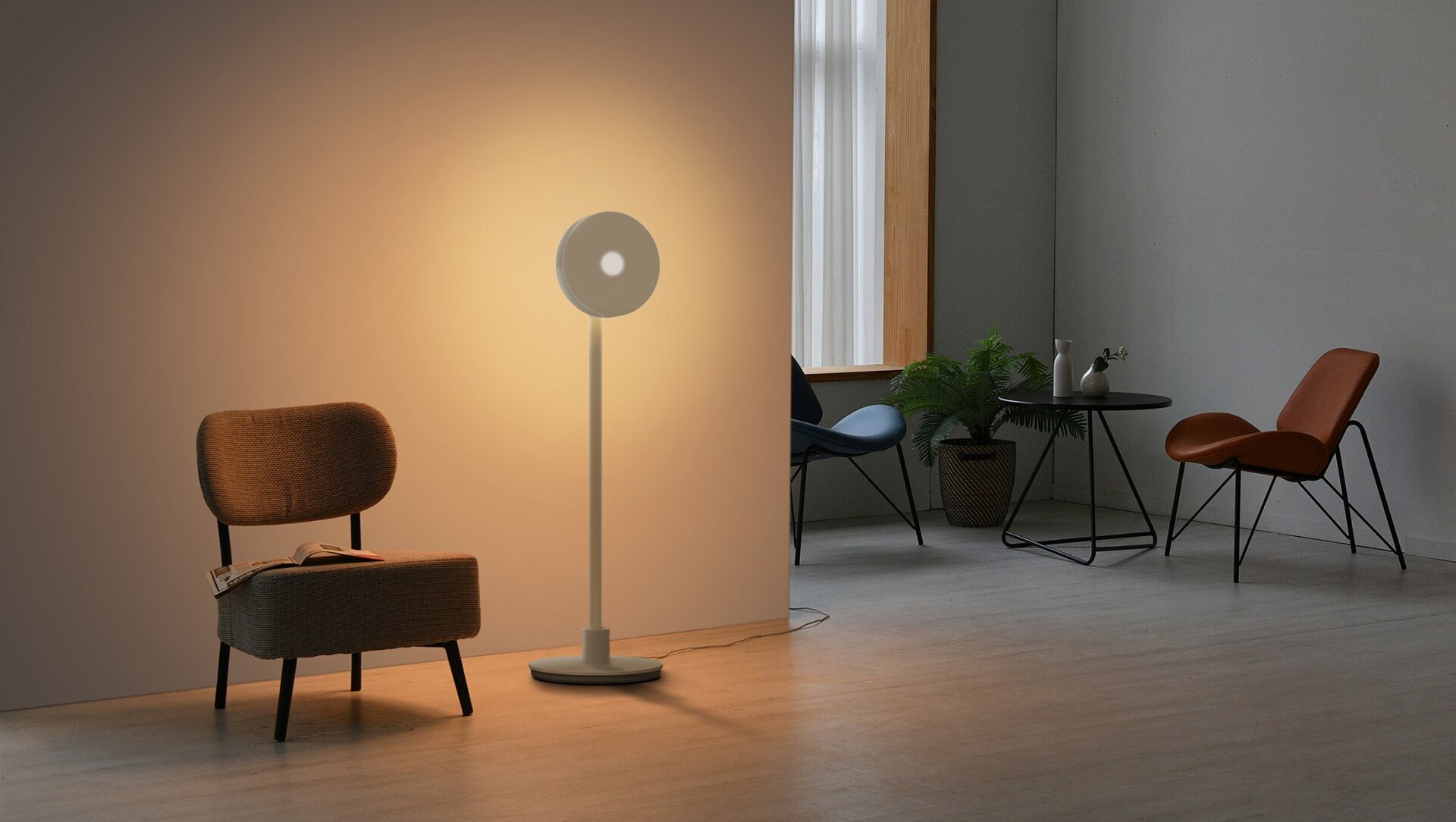 LG 3-in-1 lamp projector speaker in a room shining a light on the wall