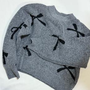 私には無理だなと思ったしまむら1490円リボン柄ニットが意外とアリだった話