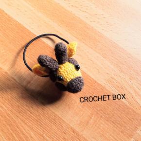 minneさんにて販売中の 編みぐるみのキリンさんのヘアゴムです。