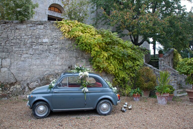 Destination Wedding in Italy - just married getaway car