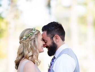 Half-Up wedding braids wedding hairstyle with flowers