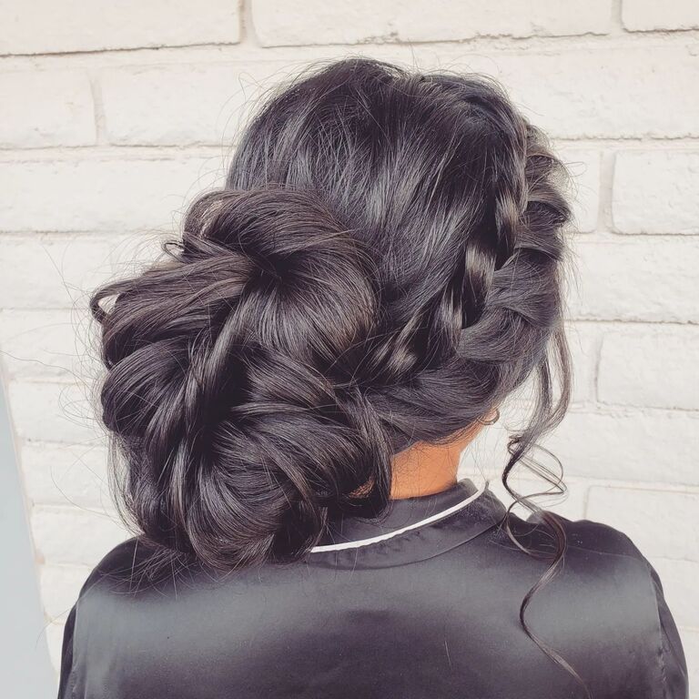 braided low bun bridesmaid hairstyle