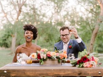 Bride and groom toasting with champagne 