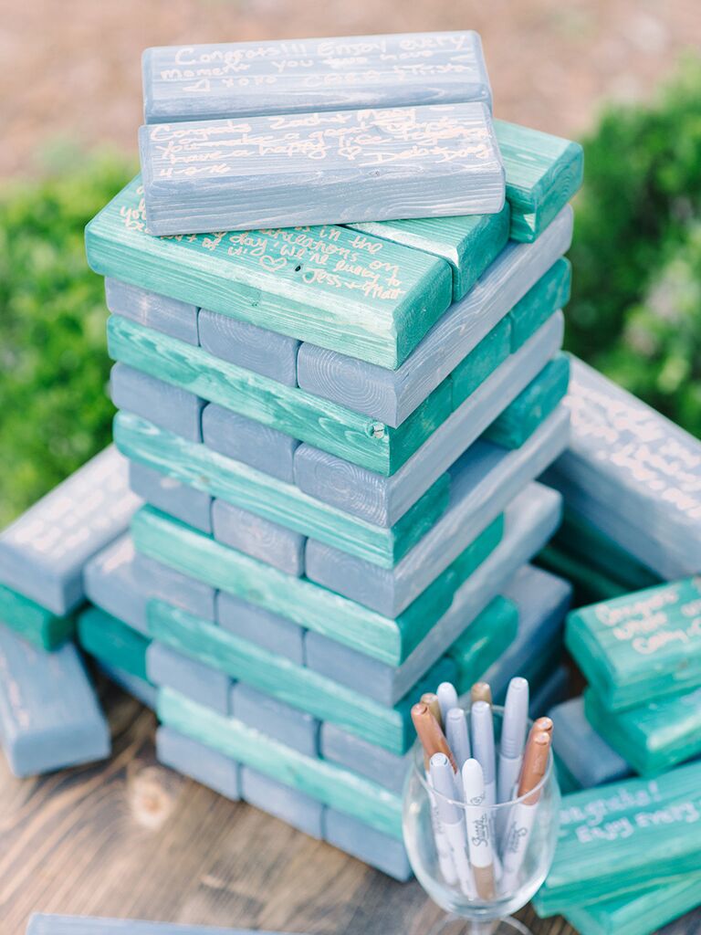 Creative guest book alternative using blue Jenga blocks - wedding details not to miss