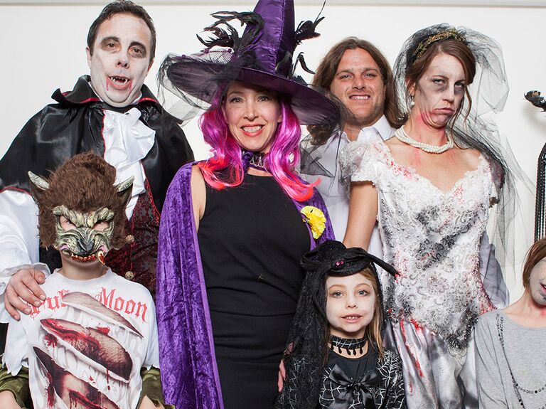 Wedding guests wearing costumes at a Halloween wedding