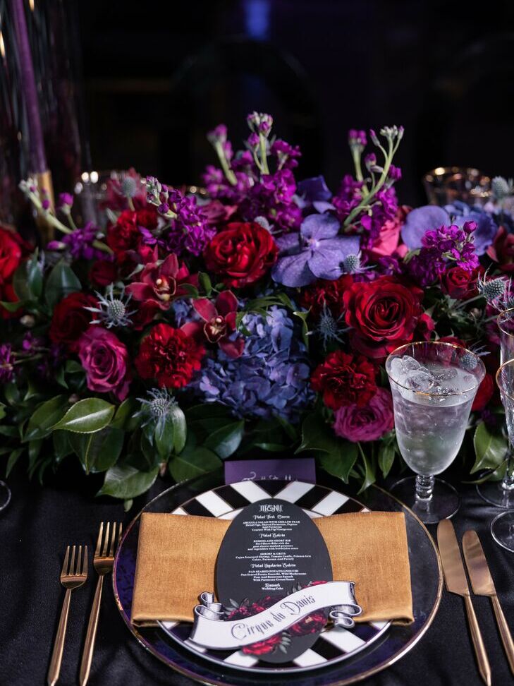 Purple and black color scheme at a Halloween wedding