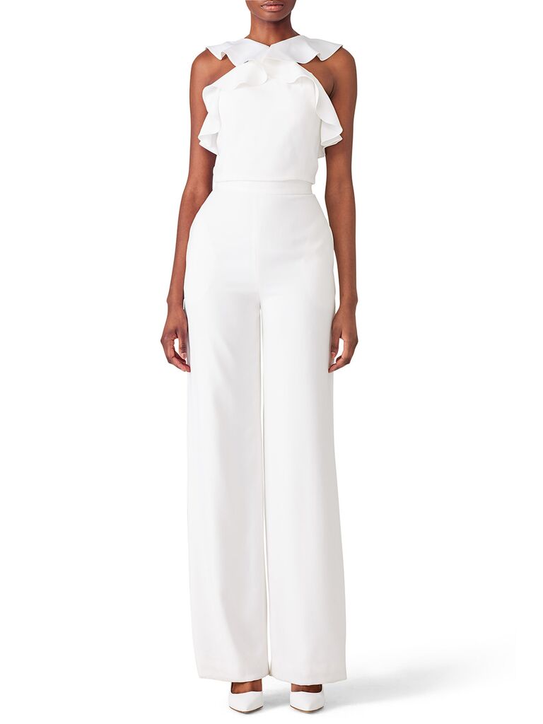 White jumpsuit with flutter halter neckline