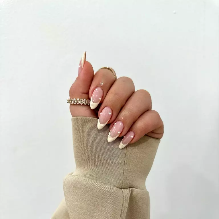 Pearl-accented French manicure wedding nails