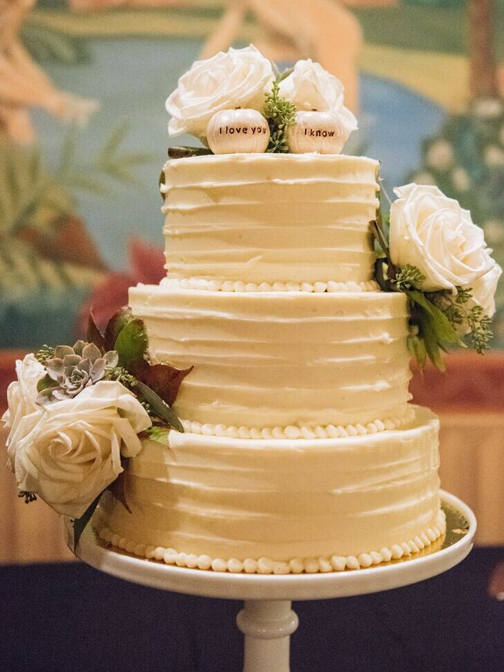 Pumpkin wedding cake toppers at a Halloween wedding