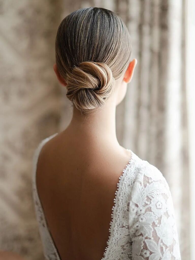 Sleek chignon wedding hairstyle