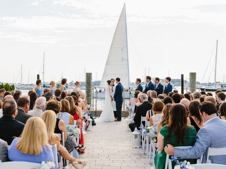 Couple exchanging their vows along the marina