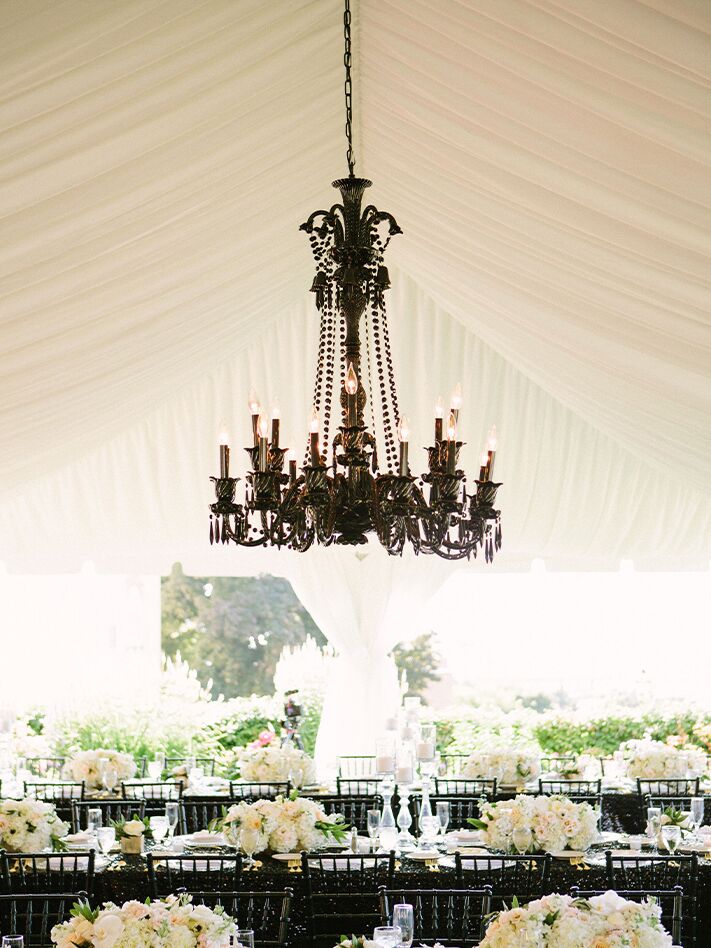 Black chandelier at a Halloween wedding