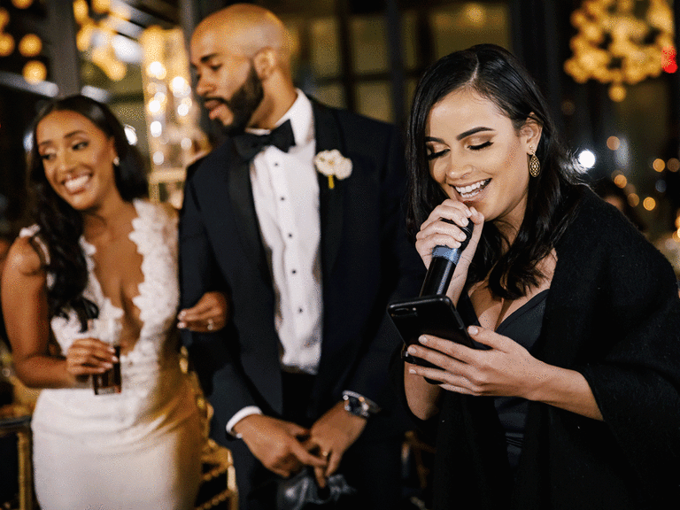 Maid of honor delivering maid of honor speech to bride and groom. 