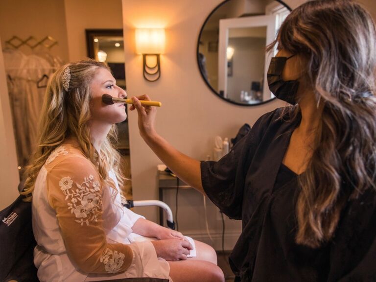 San Diego bride gets her makeup done for her wedding day. 