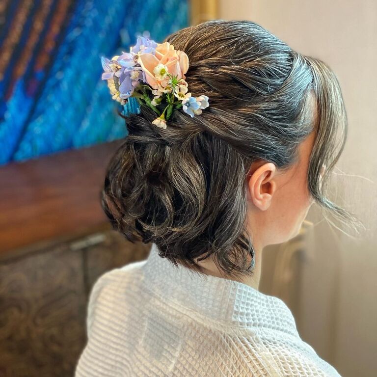 Pulled Back Flowers short wedding hairstyle