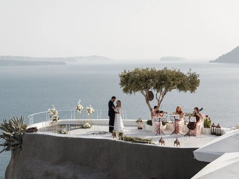 andronis wedding couple elopes on a terrace santorini