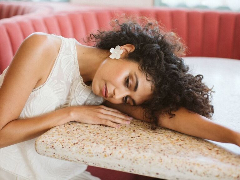 Bride with her hair and makeup natural and glowy. 