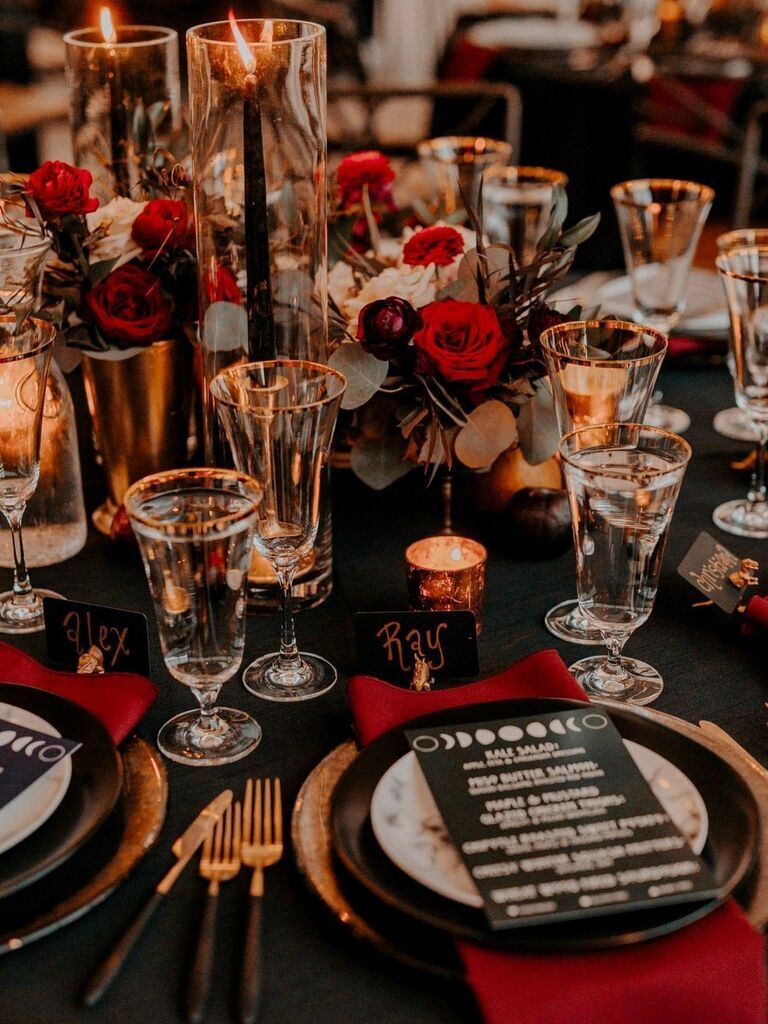 Moody red and black tablescape at a Halloween wedding