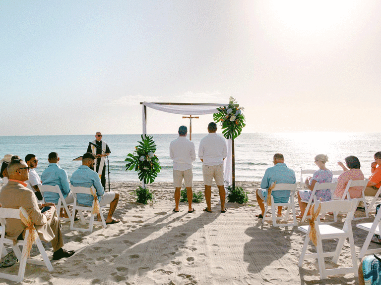 Couple marries in a beachside ceremony at Pelican Grand Beach Resort in Fort Lauderdale, FL. 