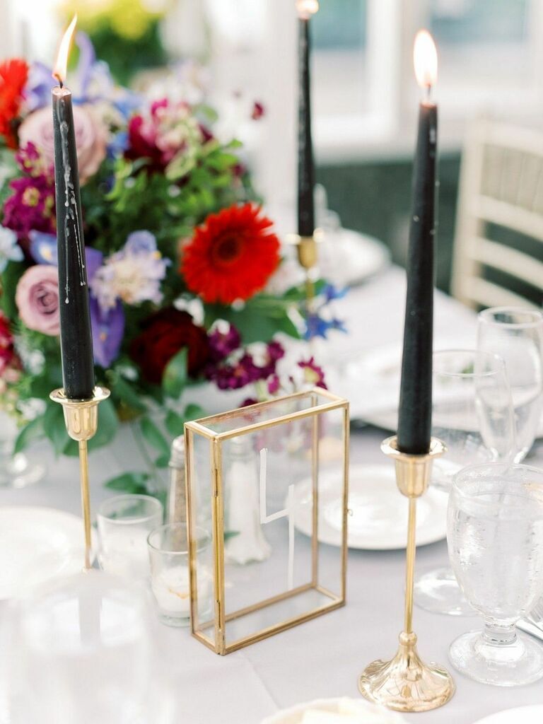 Black taper candles at a Halloween wedding