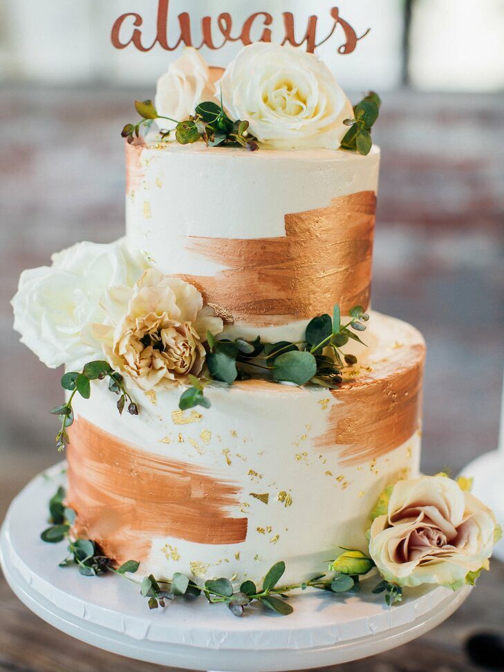 Copper and ivory wedding cake at a Halloween wedding