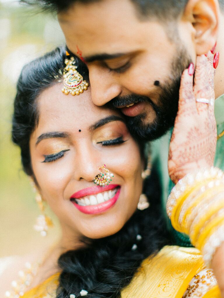 wedding makeup trial couple hugging close up on bride