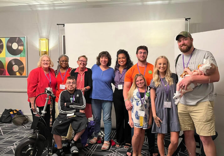 Group photo at an MPS awareness event