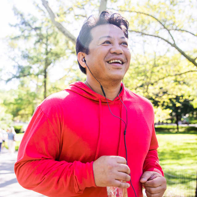 Man running through park