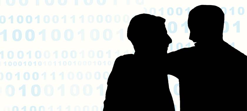 Silhouette of two men talking with their heads close together. One man had his arm around the shoulders of the other. In the background are the ones and zeroes of binary code.