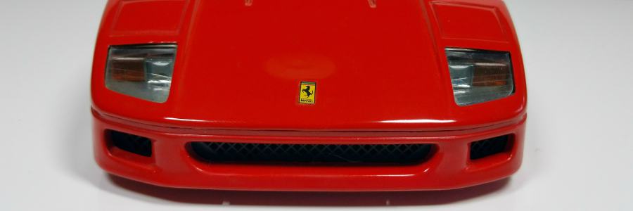 Close up on the front end of a red Ferrari