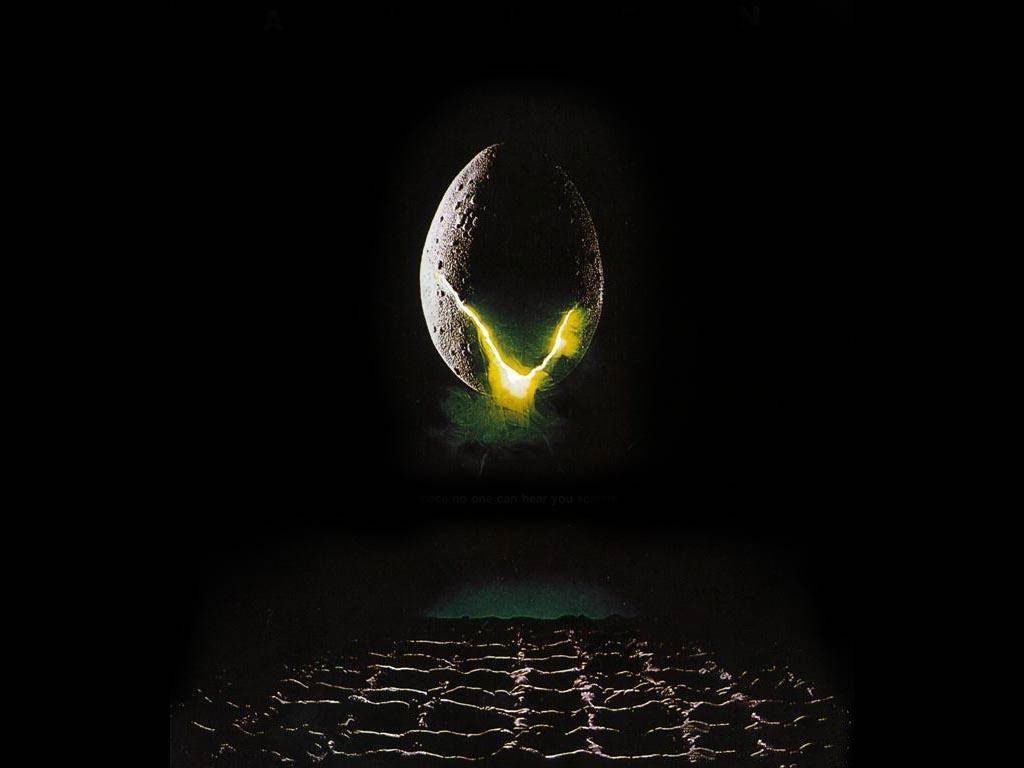 A dramatic scene from the movie Alien, featuring a cracked egg emitting eerie green light, set against a dark backdrop, hinting at the suspense and mystery of the film.