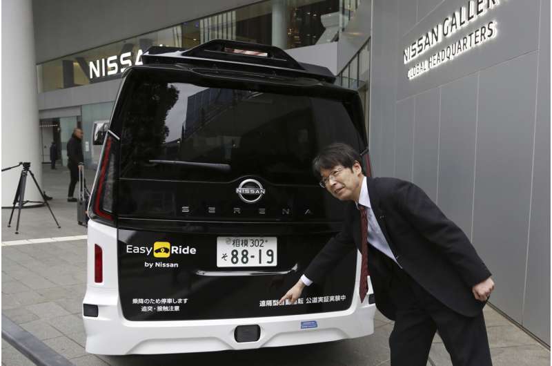 Japan's Nissan tests driverless vehicles in city streets filled with cars and people