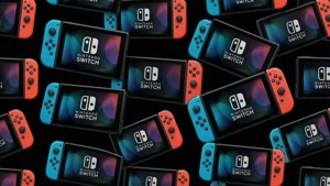 Flera Nintendo Switch-spelkonsoler med röda och blå kontroller på en svart bakgrund. bakgrundsbilder