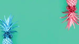 Dua Nanas Di Latar Belakang Turquoise Wallpaper