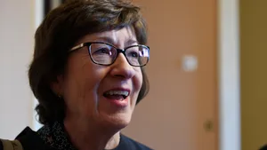 Glimlachende Susan Collins Wallpaper