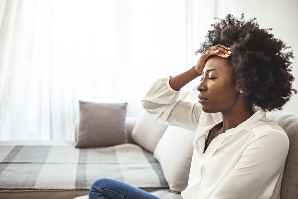 Shot of a young woman suffering from stress.