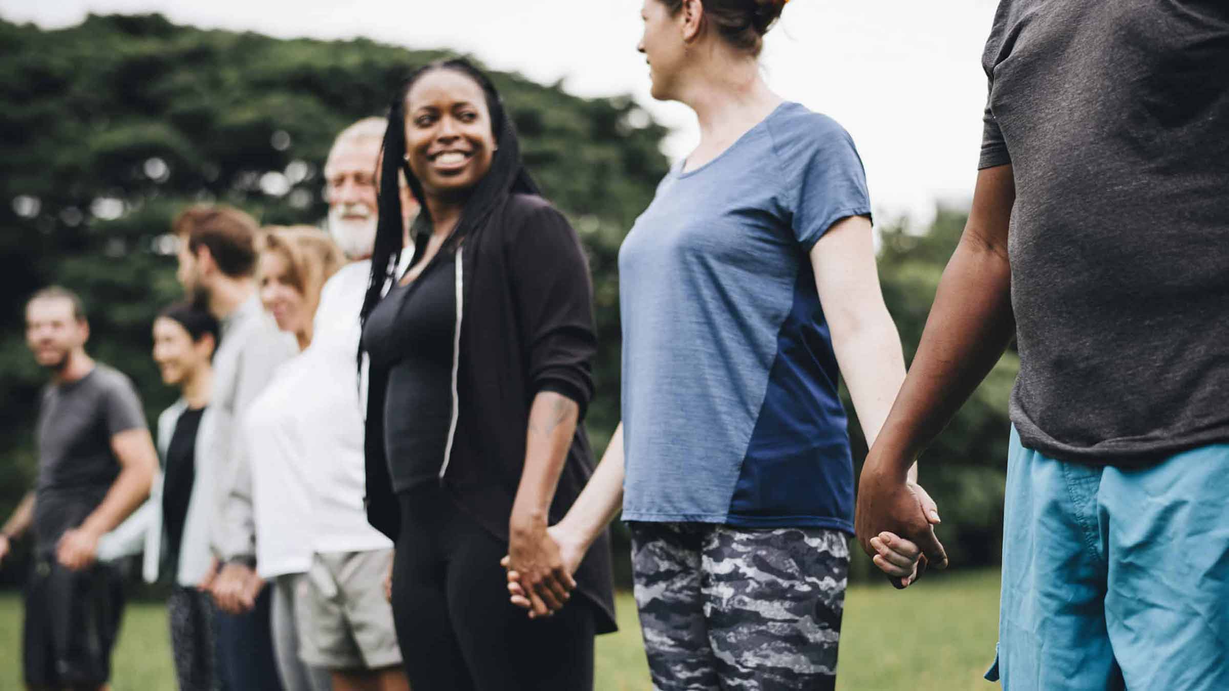 Group of People Holding Hands - Greater Twin Cities United Way