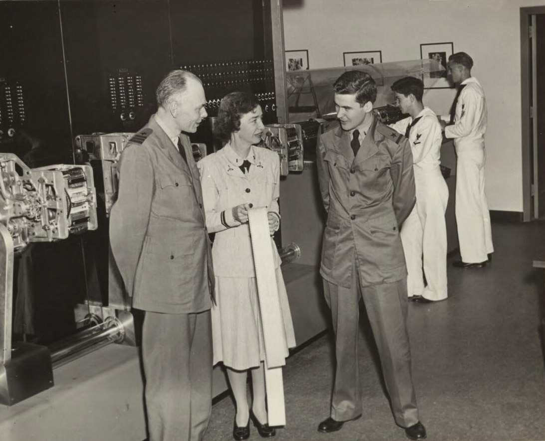 Grace Hopper with two military officers