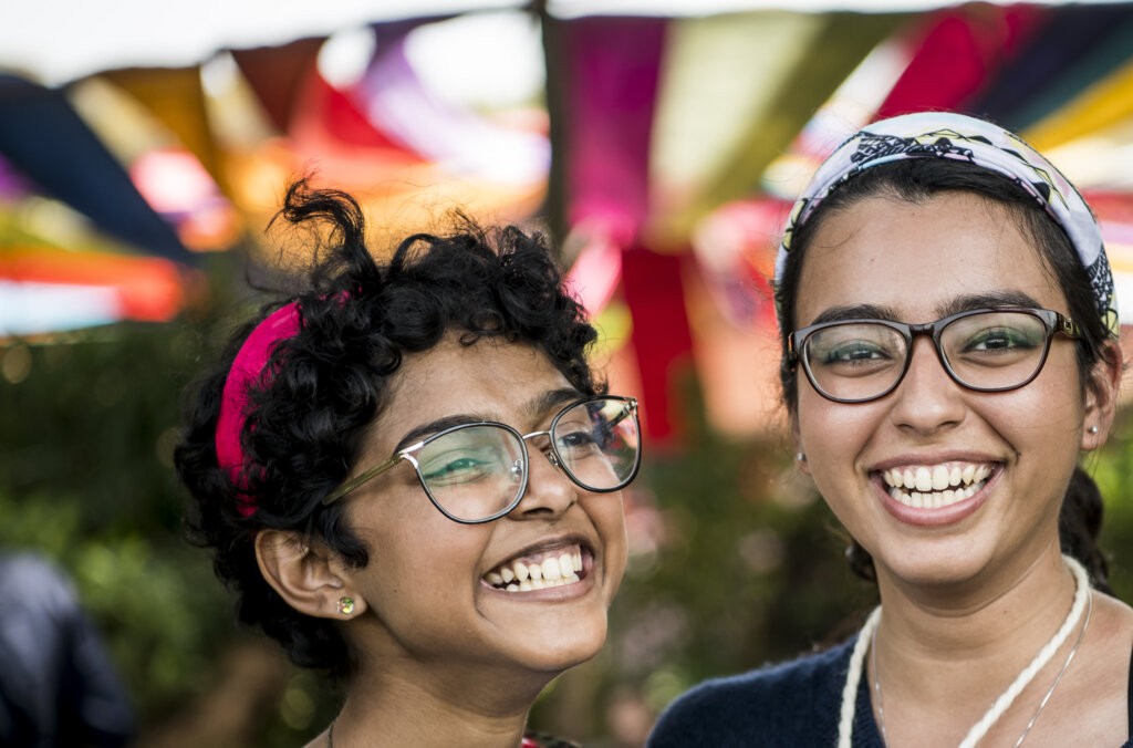 Two women smiling