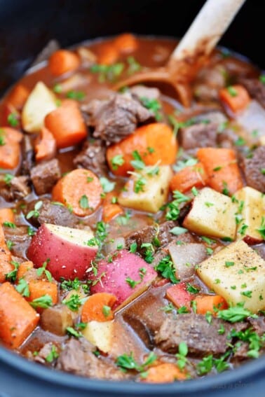 Slow Cooker Beef Bourguignon Recipe -ย A classicย beef bourguignonย recipe made easy in the slow cooker! Loaded with vegetables, beef, and a thick, rich sauce perfect for entertaining or busy weeknights.