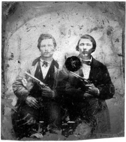 Jesse And Frank James With Guns